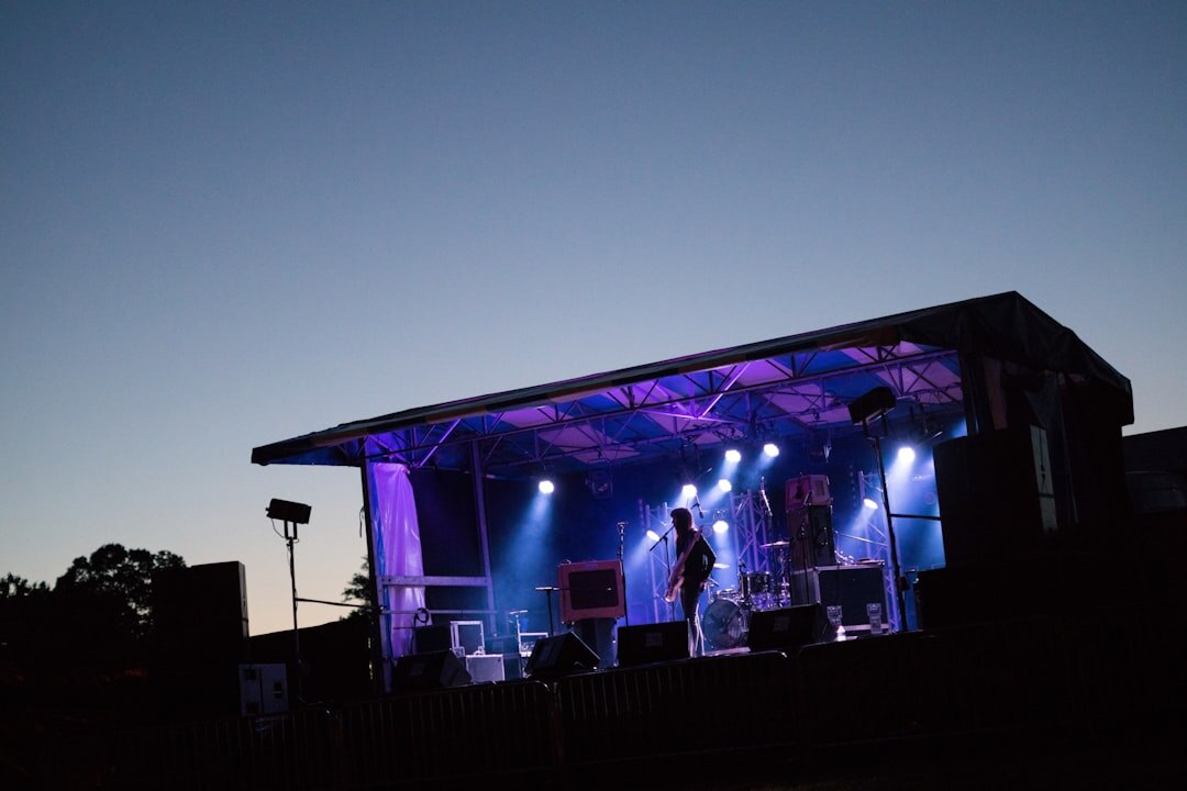 musician performing on small stage